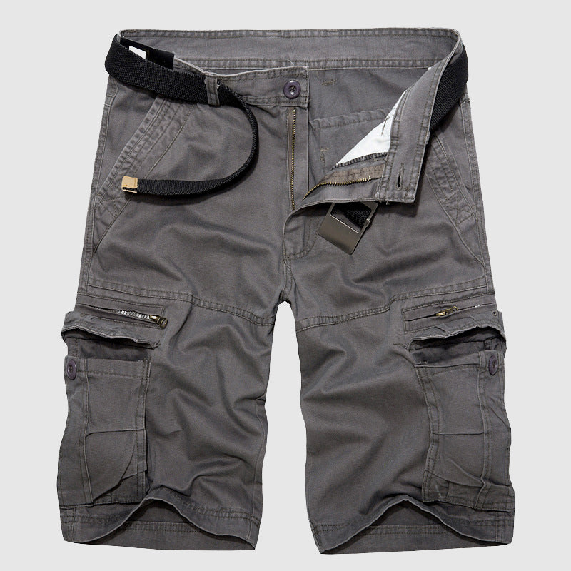 Man hiking in comfortable Men's Explorer Cargo Shorts, perfect for summer outdoor adventures.