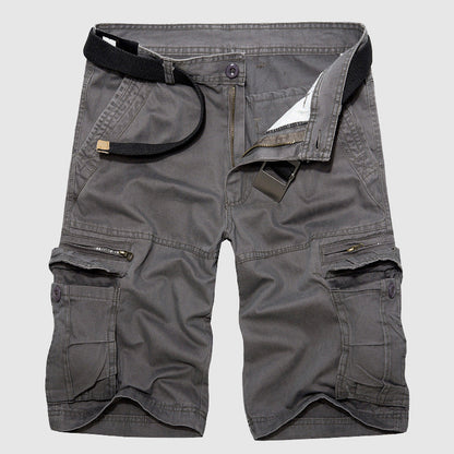 Man hiking in comfortable Men's Explorer Cargo Shorts, perfect for summer outdoor adventures.