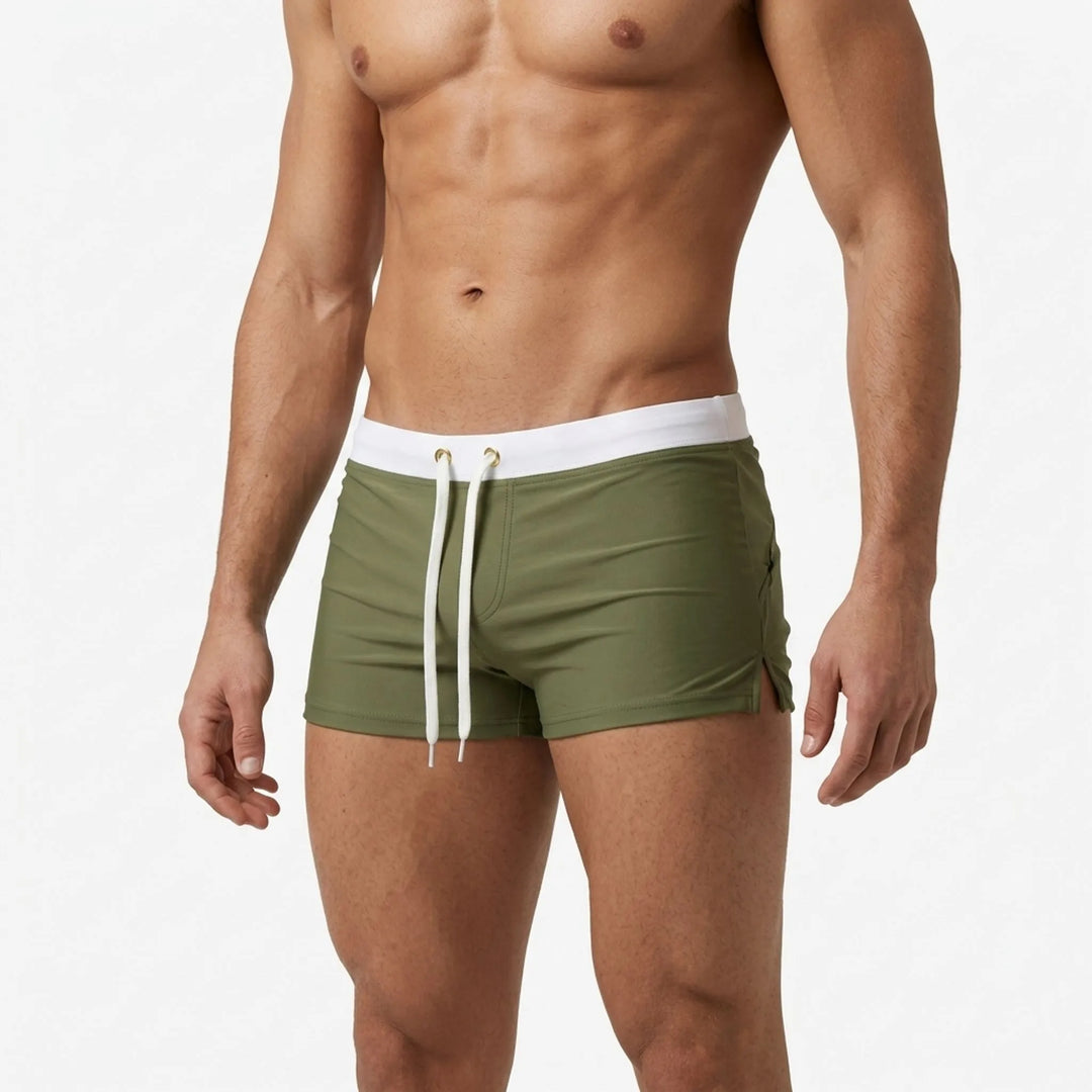 Stylish men's fitted swim shorts, quick-dry fabric, comfortable for summer.