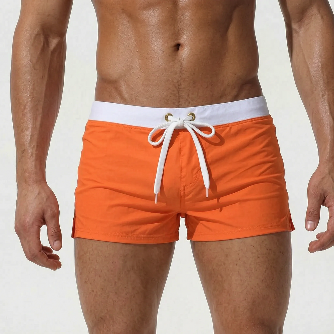 Men's fitted swim trunks in a quick-dry material, perfect for active days.