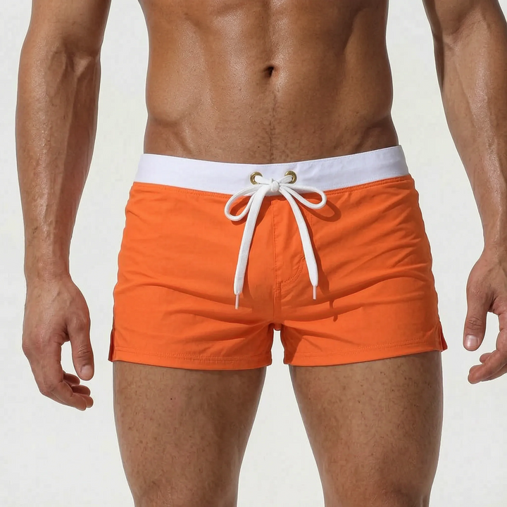 Men's fitted swim trunks in a quick-dry material, perfect for active days.