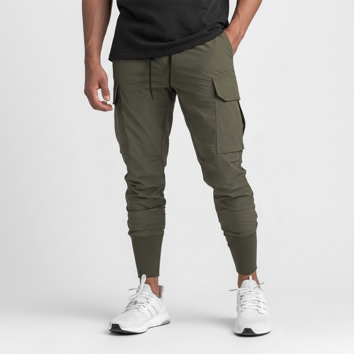 Modern tapered men's flexible movement pants, great for gym, running, or relaxed urban style.