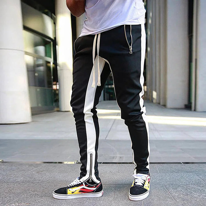 Full shot of men's FlexStride joggers in a modern fit, designed for active lifestyles, comfort, & durability.