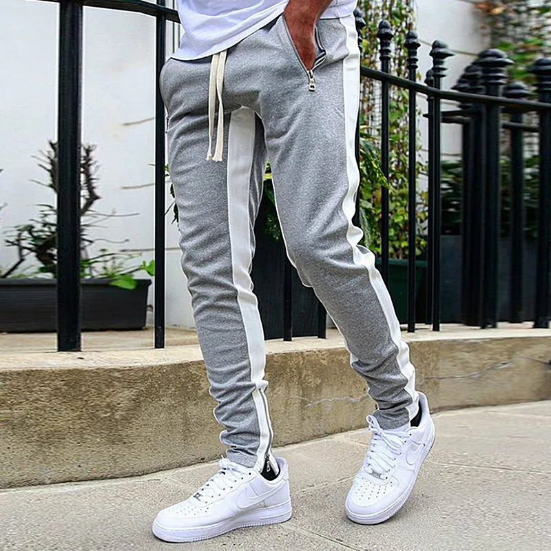 Close-up of comfortable men's FlexStride sweatpants fabric, highlighting soft texture and quality athleisure design.