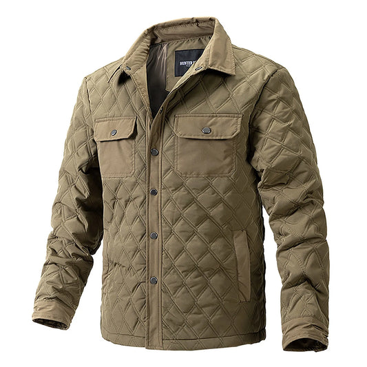 Men's Forge rugged quilted jacket, snap closure, chest pockets. Versatile lightweight outerwear.