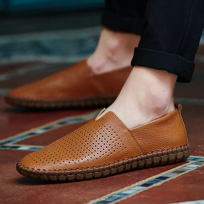 Handstitched Fresco men's loafers, perforated for airflow, ideal casual or professional footwear.