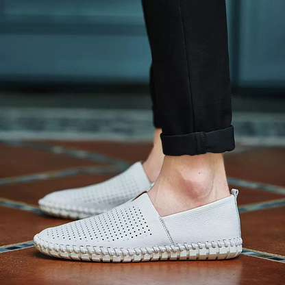 Stylish men's Fresco loafers, perforated for breathability, perfect handstitched casual footwear.