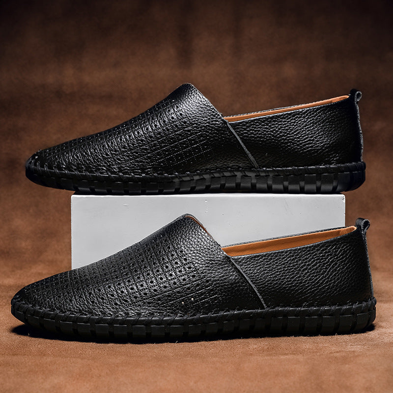 Stylish men's Fresco perforated comfort loafers, perfect for smart casual or professional attire.