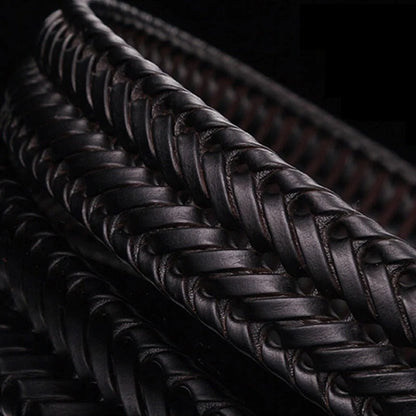 Rugged men's full-grain leather belt, intricately braided, featuring a classic brass buckle. Custom fit.