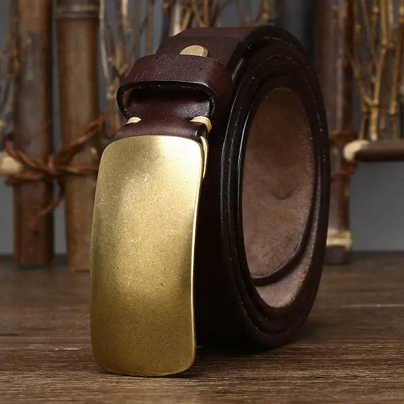 Versatile men's full-grain leather belt with a polished brass buckle, ideal for dress or casual style.