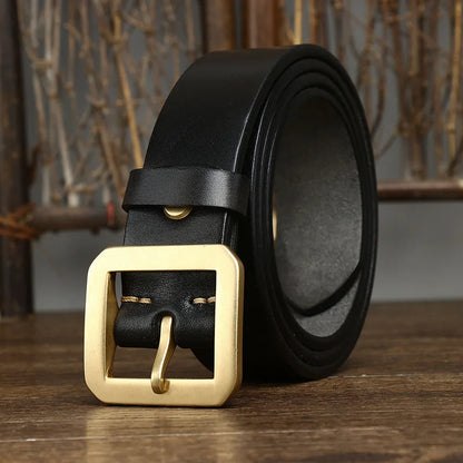 Durable men's full-grain leather belt, showcasing rich texture and a robust, classic solid brass buckle.