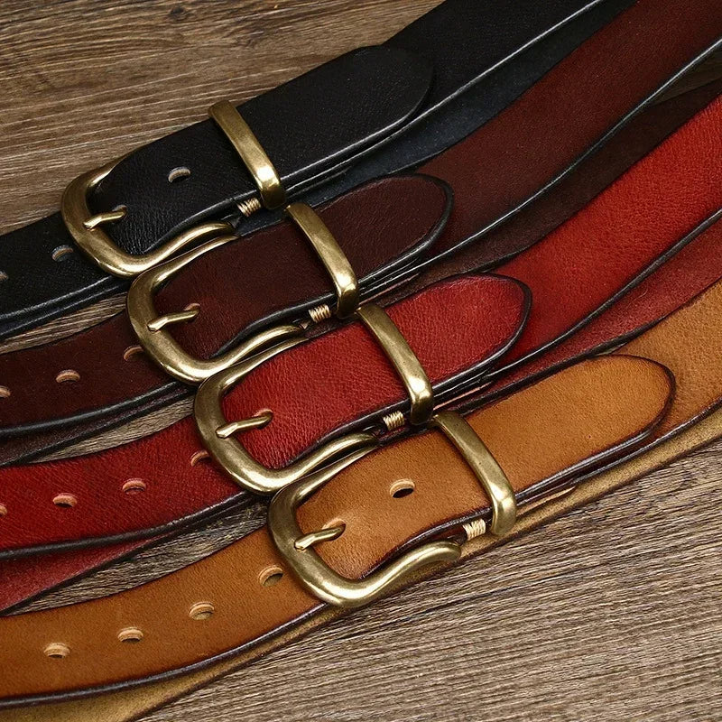 High-quality men's full-grain leather belt, showcasing its rich texture & durable brass buckle.