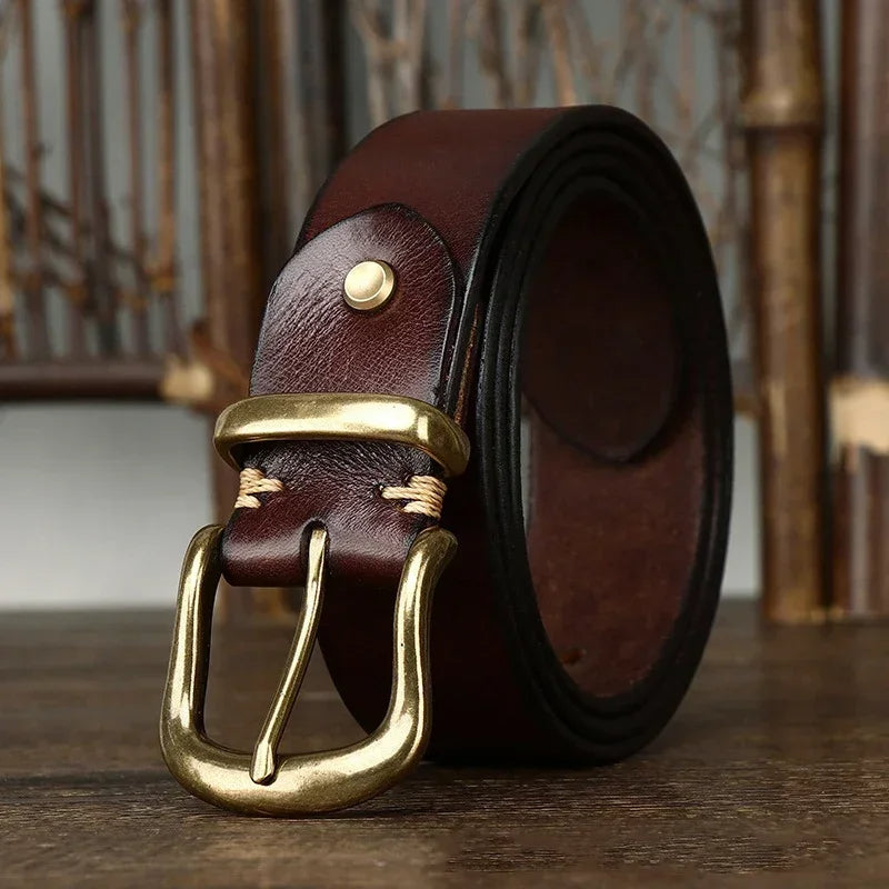 Close-up of rich full-grain leather texture on a men's classic and durable fashion belt.