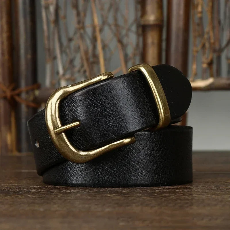 Sleek brass buckle detail on a sturdy men's full-grain leather accessory, built to last.