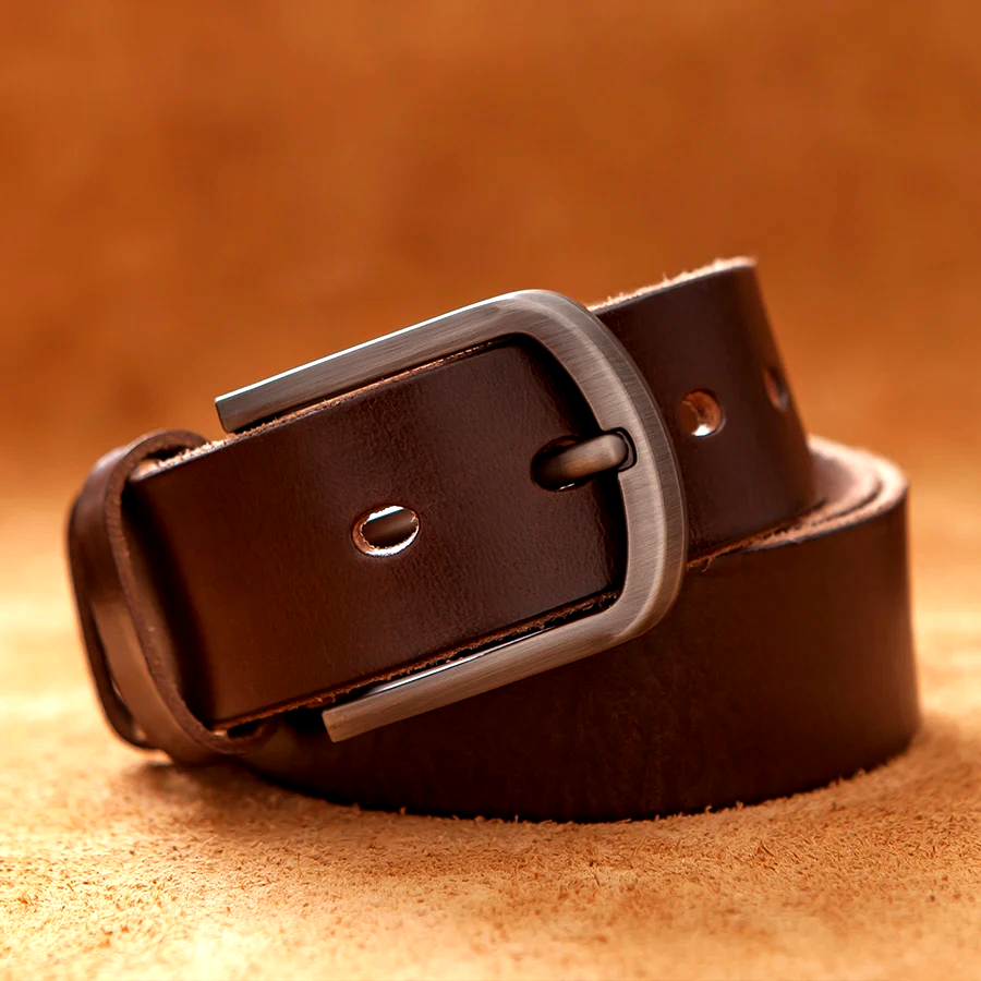 Men's genuine leather belt with a stylish vintage buckle. Durable and versatile men's accessory.