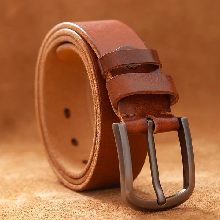 Premium genuine leather belt for men, featuring a durable vintage-style buckle. A stylish men's accessory.