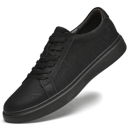 Black men's genuine leather casual sneakers. Comfortable and durable footwear for everyday wear.