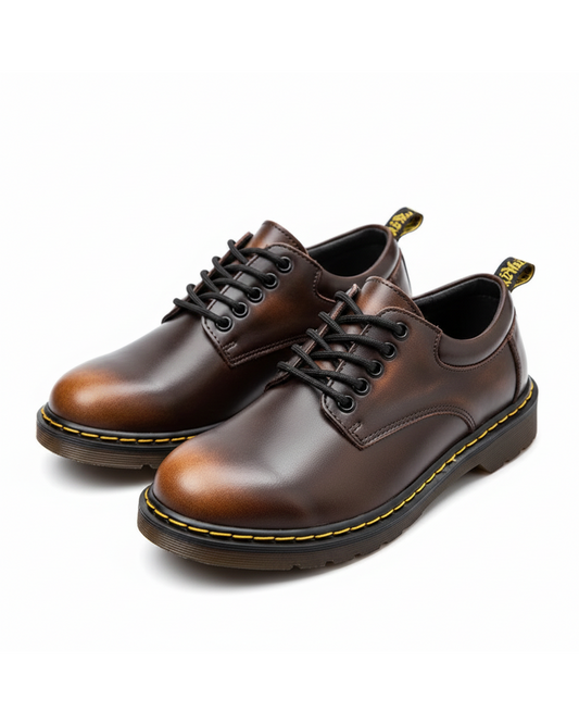 Men's genuine leather low-cut kicks in brown, offering comfort & style. Round toe casual footwear.