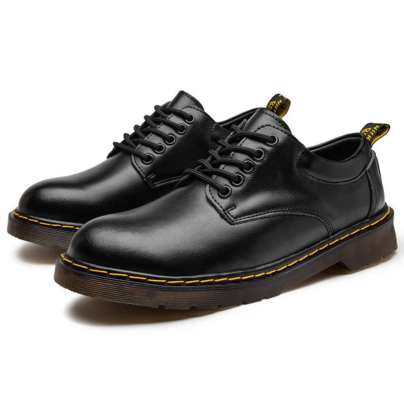 Black men's genuine leather low-cut kicks. Durable, stylish casual shoes with ultimate comfort.