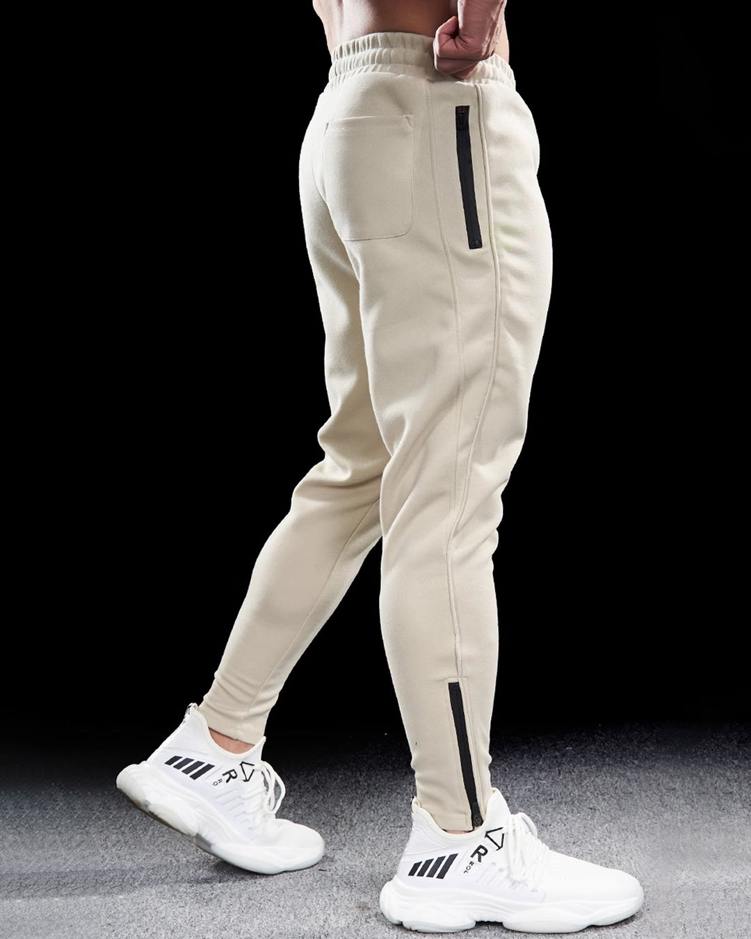 Durable men's Girona Zip Joggers, activewear track pants with practical zippered hems.