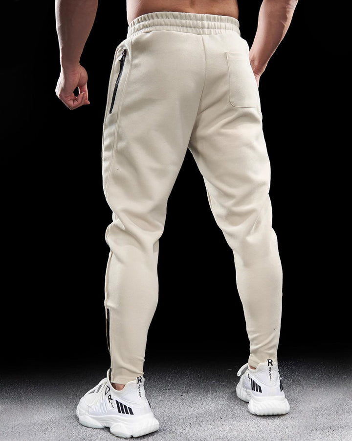 Versatile men's Girona Zip Joggers, tapered fit sweatpants ideal for active lifestyles.