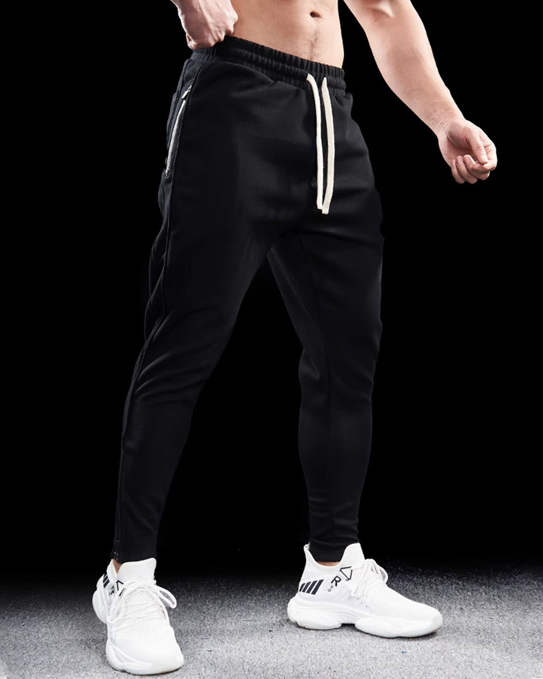 High-quality men's Girona Zip Joggers, athletic pants with zippered ankles for custom fit.