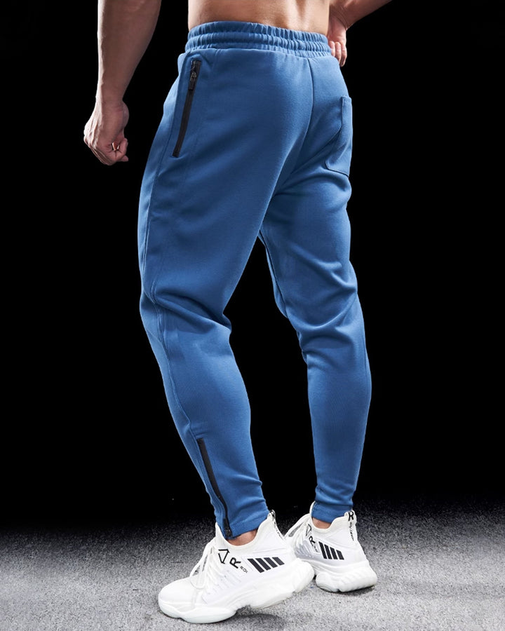 Stylish men's sweatpants, Girona Zip Joggers with zippered hem for ultimate comfort.