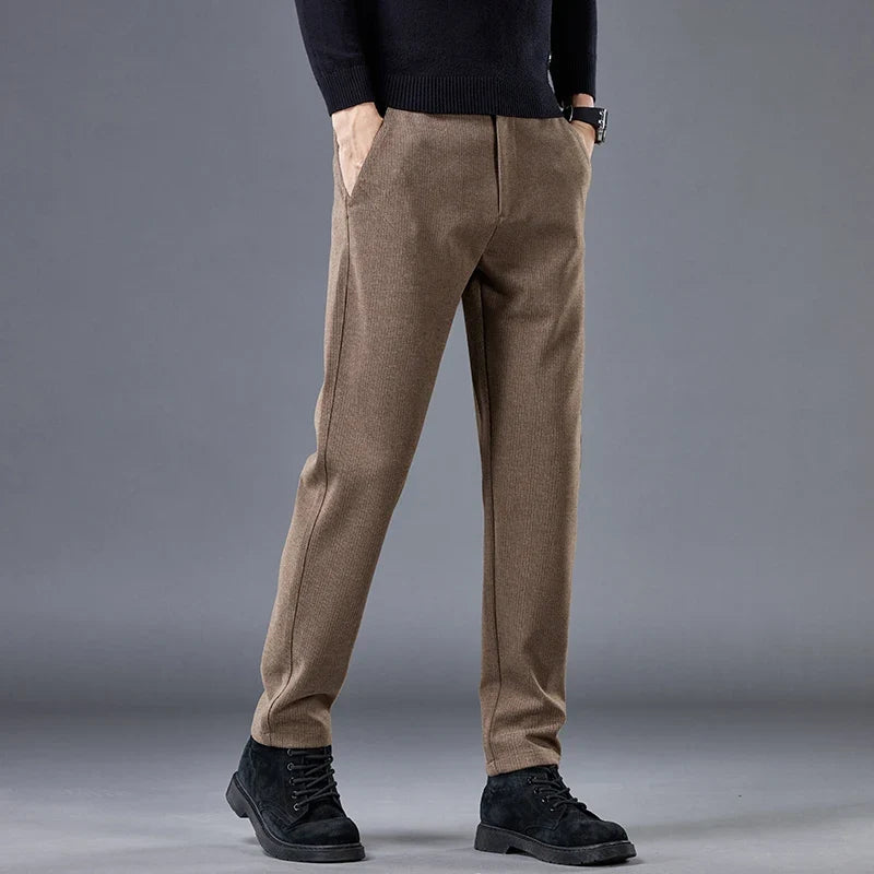 Tailored men's contour fit pants with comfortable stretch fabric. Modern style, versatile for work or casual events.