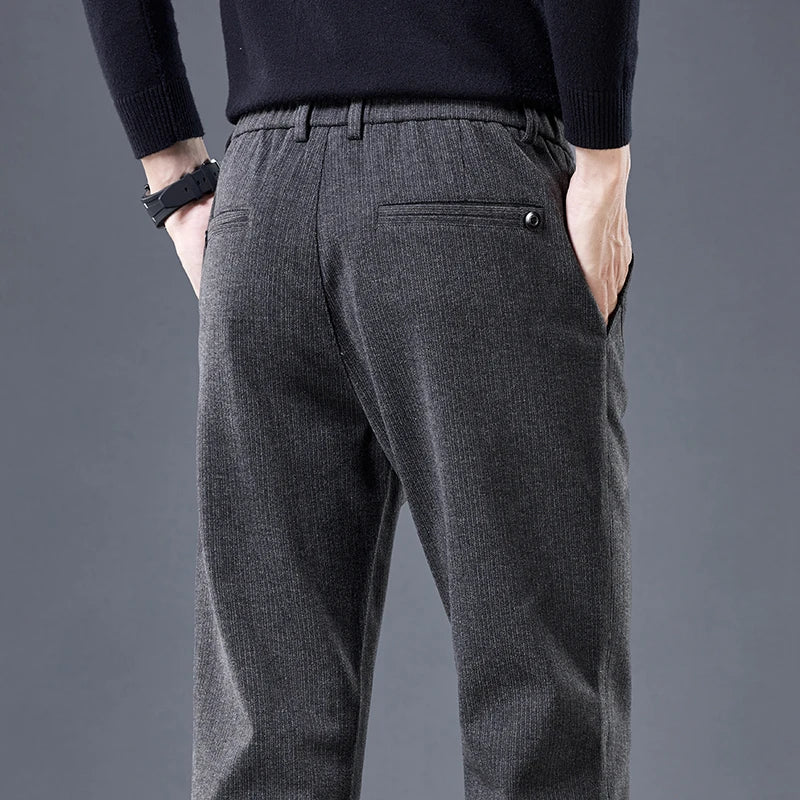 Wrinkle-free men's contour fit pants. Tailored look with stretch comfort, great for versatile everyday wear.
