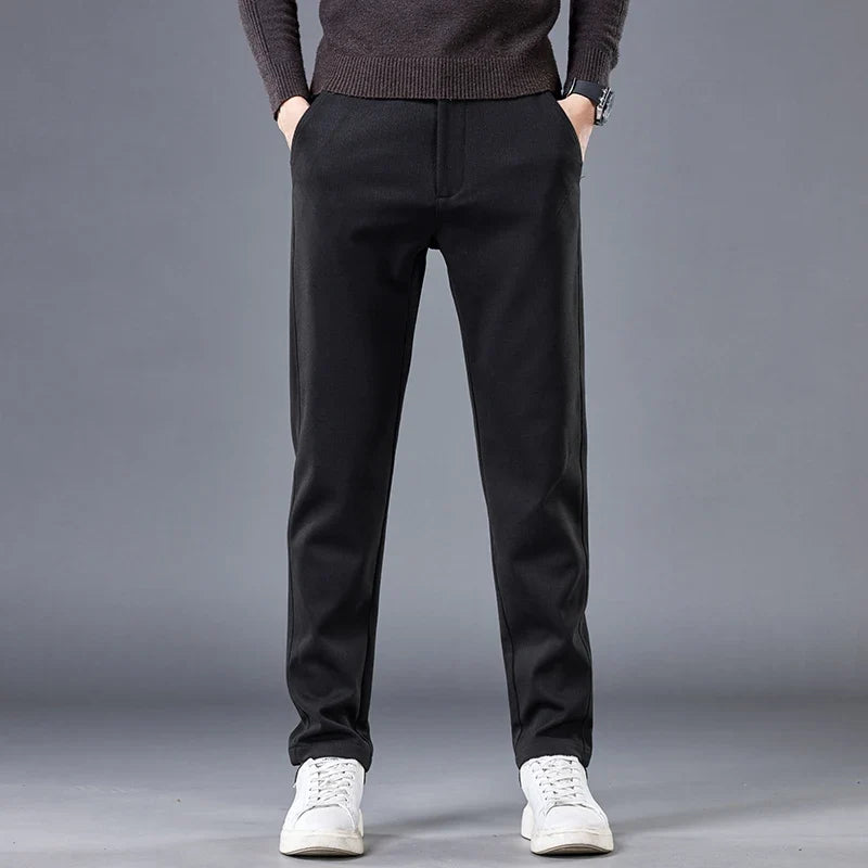 Modern black men's contour fit pants. Tailored comfort & stretch for versatile casual or office wear.