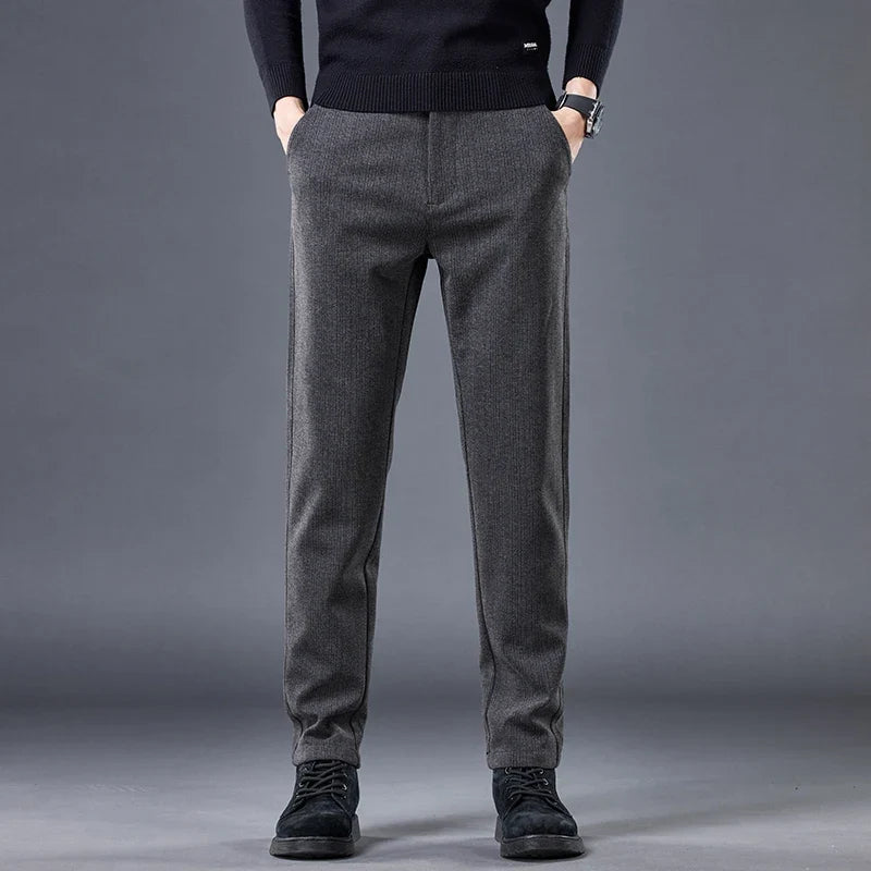 Khaki men's tailored contour fit pants. Comfortable stretch fabric provides modern style for versatile wear.