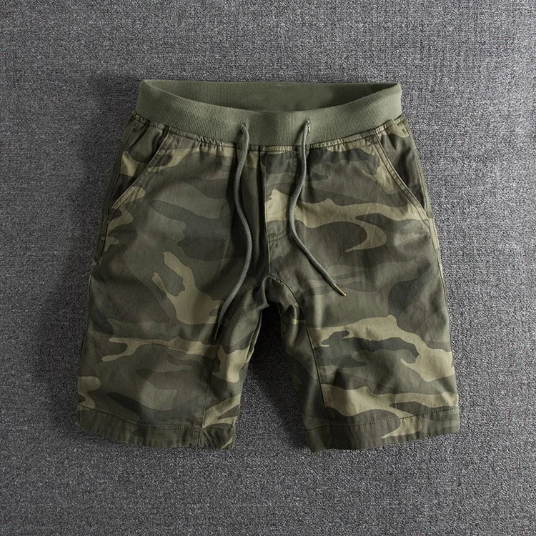 Men's gray & green camouflage shorts, perfect for casual outdoor adventures or comfortable activewear.