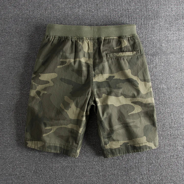 Versatile men's camo shorts in gray-green pattern, ideal for active and casual wear, ensuring all-day comfort.