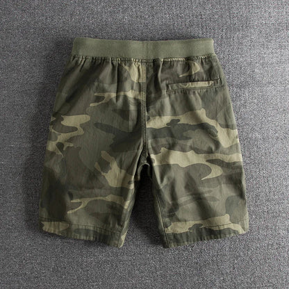 Versatile men's camo shorts in gray-green pattern, ideal for active and casual wear, ensuring all-day comfort.