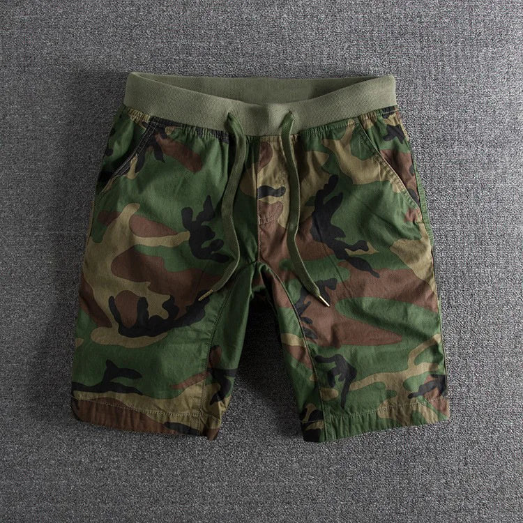Adventure-ready men's camouflage shorts; comfortable, versatile gray & green activewear for outdoor pursuits.