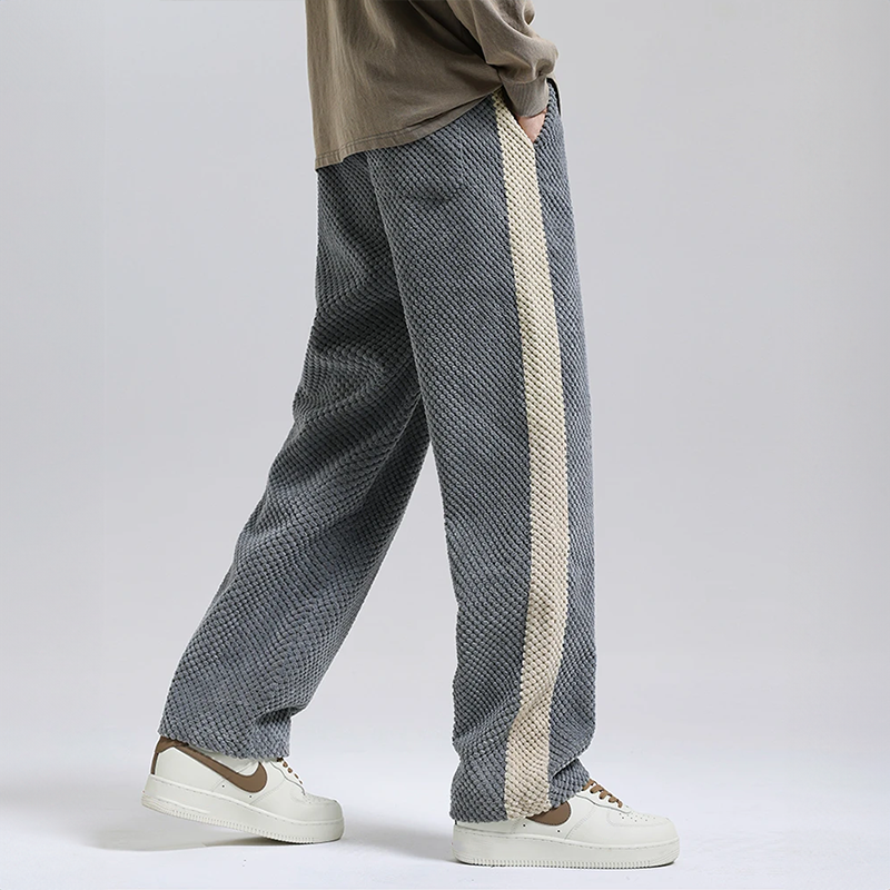 New arrival: Men's waffle corduroy jogger pants in a stylish gray, blending comfort with streetwear.
