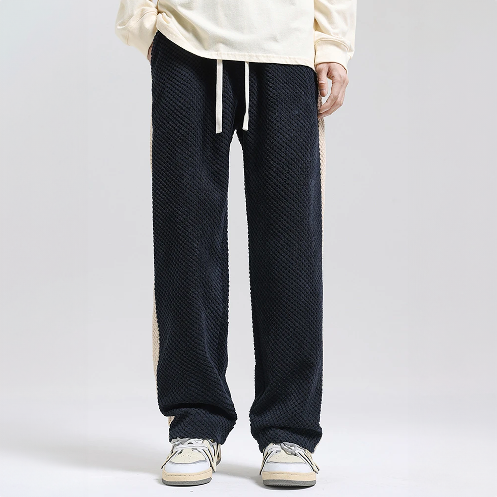 Soft men's gray waffle corduroy joggers, versatile for active wear or casual lounging.