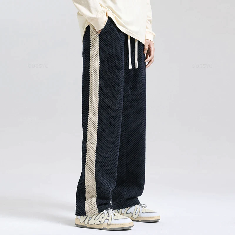 Stylish men's gray corduroy joggers with a unique waffle knit design, perfect for new arrival fashion.