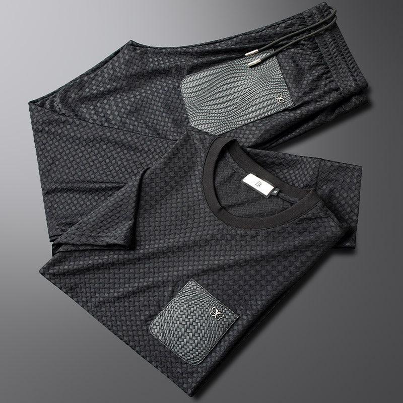 Effortless men's comfort lounge set in black. Two-piece matching outfit for relaxed style.