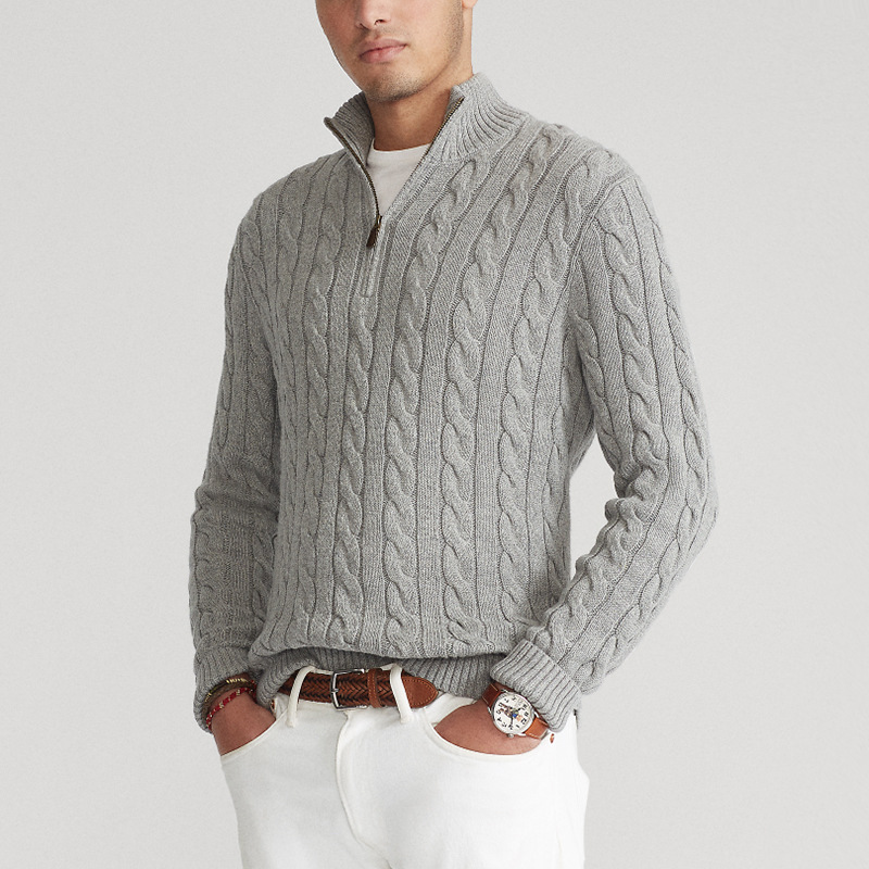 Men's half zip cable knit sweater in a cozy fabric, perfect for winter layering.