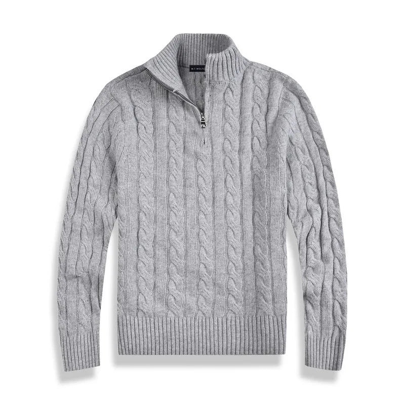 Elegant men's half zip cable knit pullover in a classic style for winter fashion.