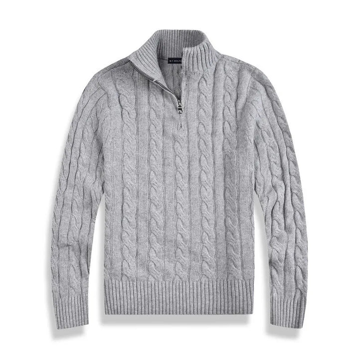 Elegant men's half zip cable knit pullover in a classic style for winter fashion.