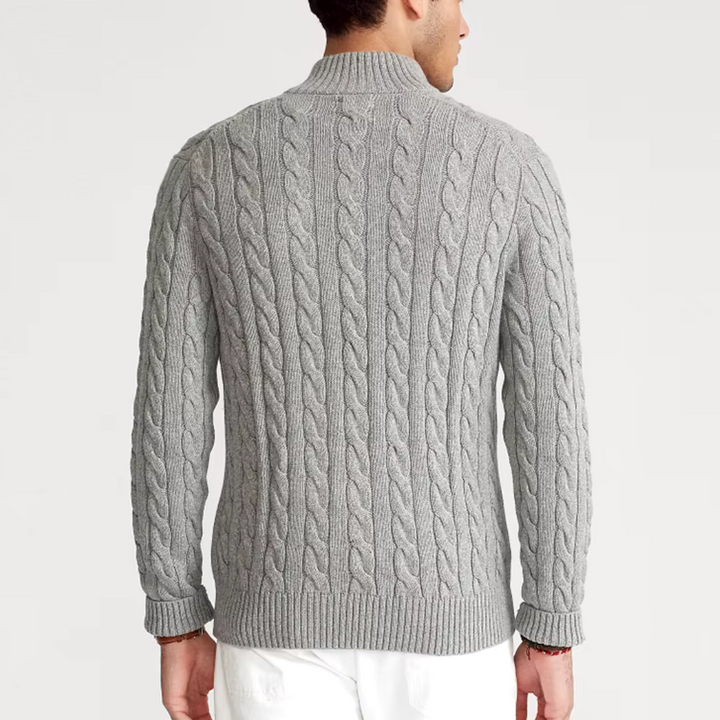 Warm men's cable knit sweater with a half zip, a cozy essential for cold winter days.