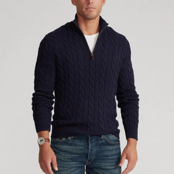 Versatile men's half zip cable knit sweater, ideal as a layering top for winter apparel.