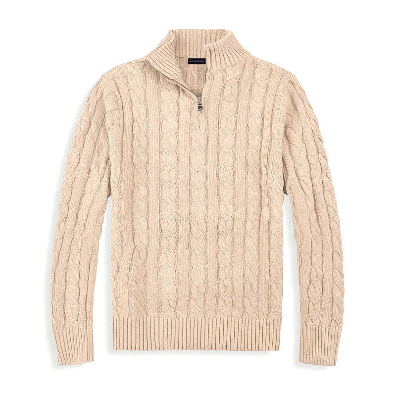 Stylish man wearing a classic half zip cable knit sweater, perfect for elegant winter fashion.