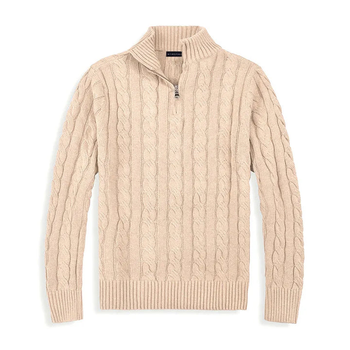 Stylish man wearing a classic half zip cable knit sweater, perfect for elegant winter fashion.