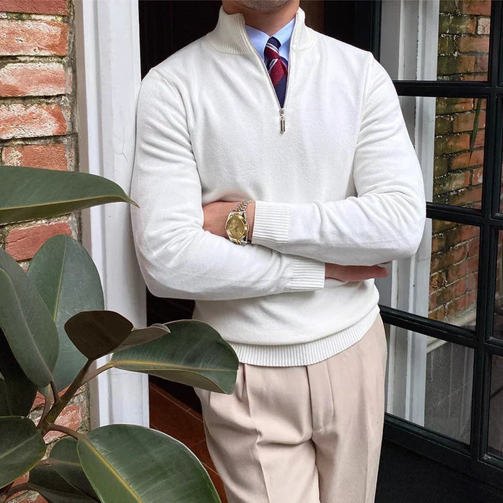 Stylish men's navy half-zip knit sweater, offering comfort & a sophisticated smart casual look for cold winter days.