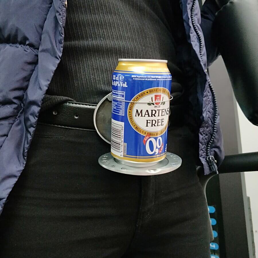 Close-up of the stylish men's belt buckle beer holder, ready for your favorite beverage.