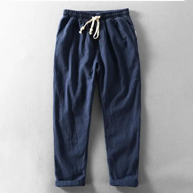 Comfortable men's linen blend trousers, breathable and relaxed fit for summer.