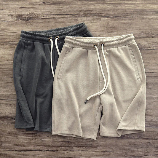 Men's Harlan performance shorts for gym & casual wear. Comfortable athletic shorts with drawstring waist.